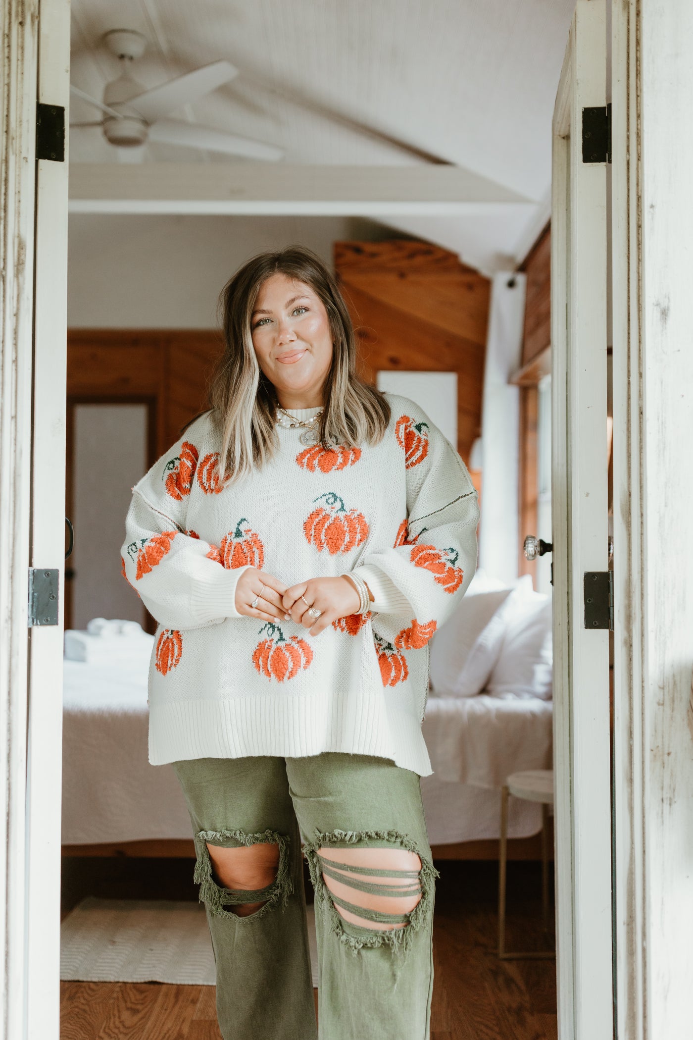 Cream and Orange Pumpkins All Over Sweater