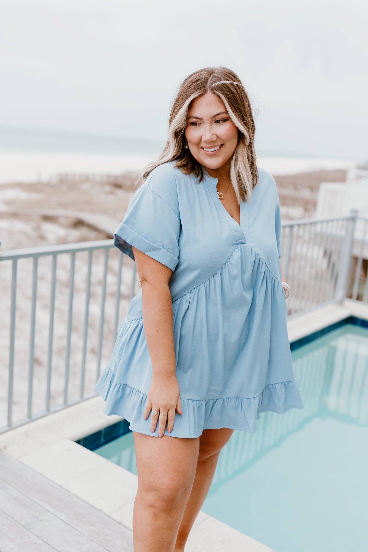 Sky Pleated V-Neck Swing Dress