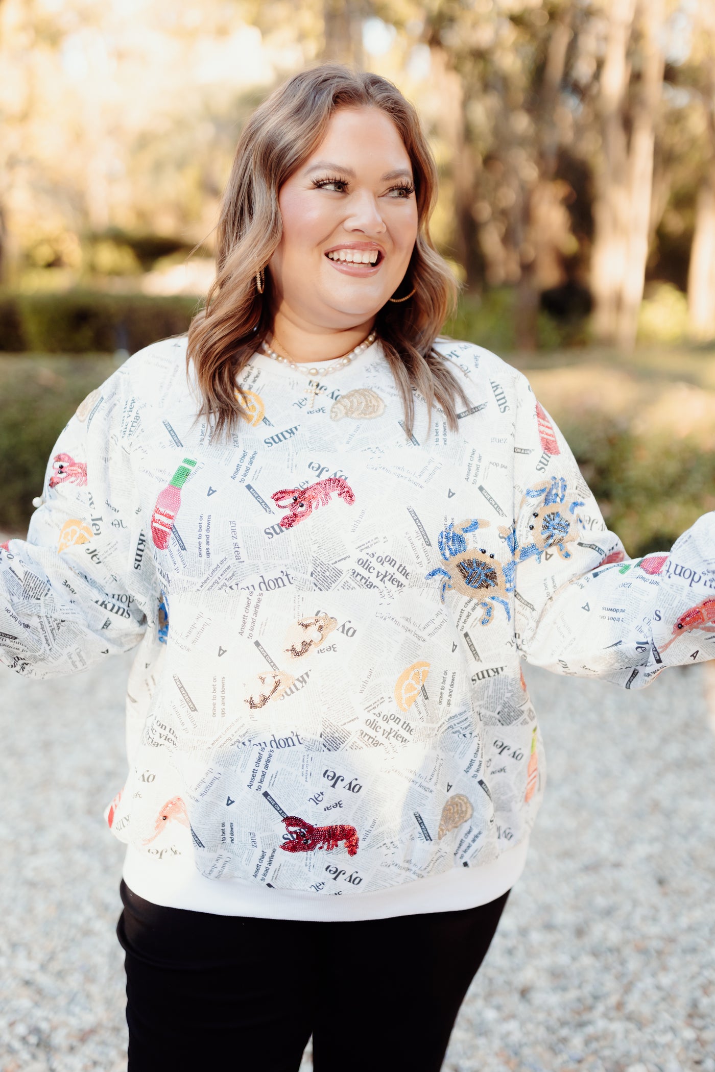 Queen of Sparkles Black/White Newspaper With Seafood Sweatshirt